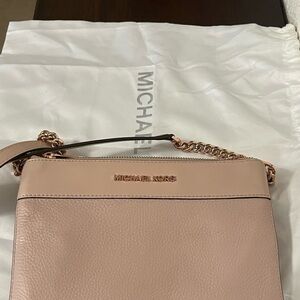 Michael Kors rose gold crossbody with built in wallet